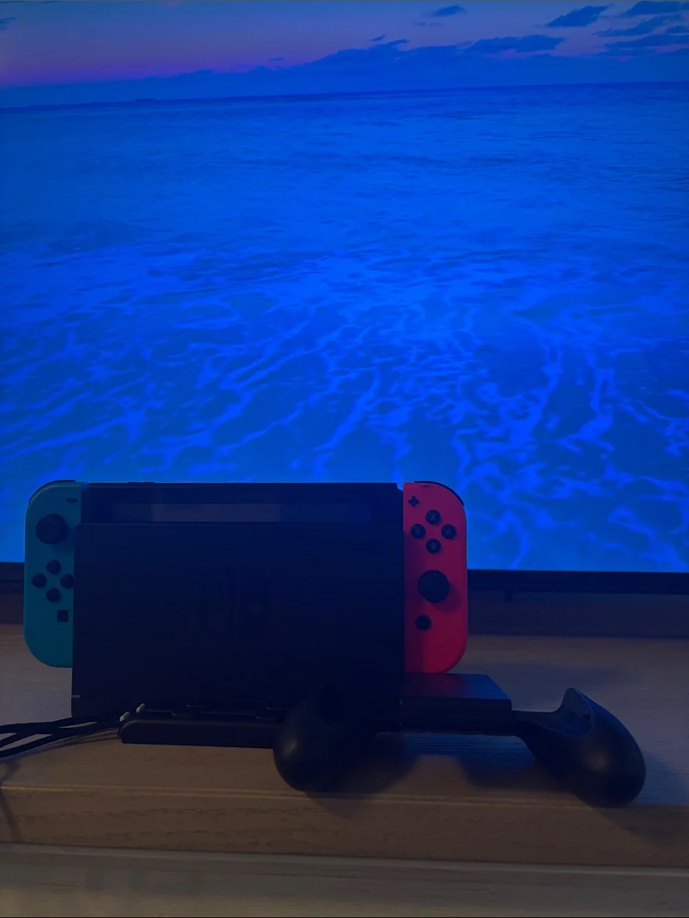 Nintendo Switch with Neon Red and Neon Blue Joy-Con